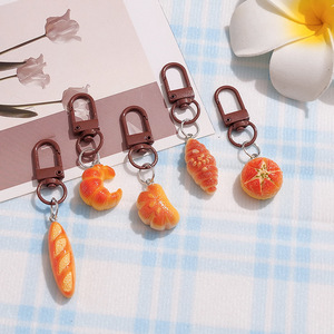 Porte-clés et breloque de sac en résine, réaliste, en forme de desserts 3D (pain, croissant, concha, pain mexicain) et de bougies Farine - Product Image 6