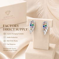 Vente en gros de boucles d'oreilles pour femmes en argent sterling 925 avec ailes d'ange et zircon cubique coloré, bijoux