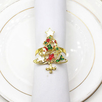 Rond de serviette raffiné Les fermoirs de serviette de Noël évidés sont utilisés pour les décorations de fête dans les restaurants d'hôtels familiaux