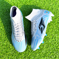 Chaussures de football d'été personnalisées en gros à prix abordable, à tige haute, semelle intermédiaire en EVA, semelle extérieure en PVC, unisexe