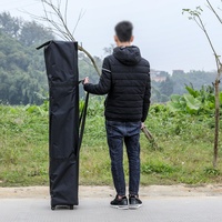 Tente pliable à quatre côtés avec roues, design parapluie grand format pour événements extérieurs, publicité promotionnelle et salons professionnels, abri contre la pluie