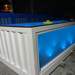Piscina Portatile Commerciale Quadrata per Esterni con Struttura in Acciaio Visibile, Generatore di Onde, Pompa di Calore e Massaggio - Product Image 1