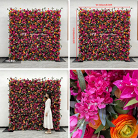 Panel floral reutilizable de flores de color rosa intenso y naranja brillante para decoración de fondo de escenario en bodas y fiestas.