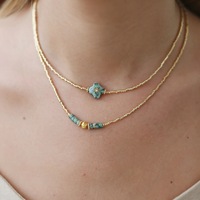 Collier d'usure quotidienne transfrontalière Niche série Yusen trèfle à quatre feuilles Design chaîne mince dorée pierre naturelle laiton