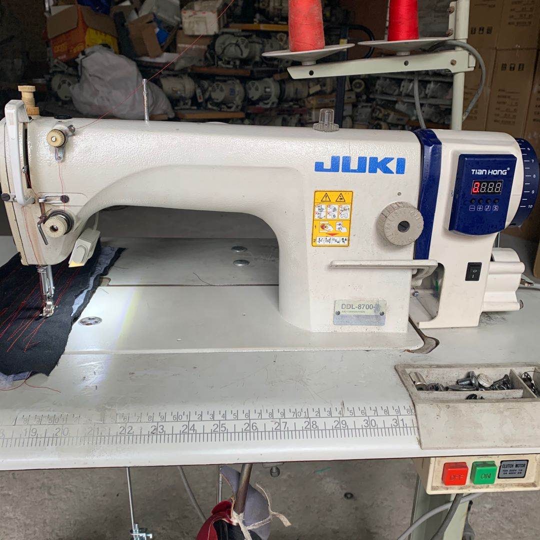 Vente d'entrepôt USED JUKI-8700D-7 prix de la machine à coudre industrielle à point noué