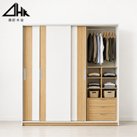 Armoire coulissante en bois avec tringle de suspension, étagères, paniers et trois tiroirs – Organisateur de placard pour chambre à coucher