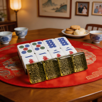 Élégant ensemble de Mahjong en acrylique doré à paillettes foncées, tuiles polies gravées au laser, blocs solides durables pour jeux de table en intérieur