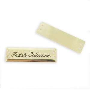 ป้ายโลหะติดเสื้อผ้าแบบกำหนดเองสำหรับ OEM ป้ายโลโก้โลหะคุณภาพสูงสำหรับฮิญาบ/เสื้อผ้า - Product Image 1