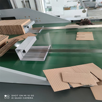 Machine de fabrication de boîtes entièrement automatique pour assemblage de cloisons en carton