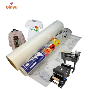 Qinyu dijital baskı 60cm x 200m dtf sıcak laminasyon transfer baskı pet film kağıt paketi levha 48*64cm dtf filmi