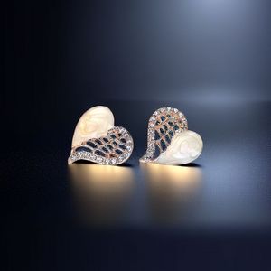 Orecchini a cuore per donna, semplici e dolci, accessori per l'uso quotidiano - Product Image 1