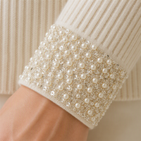 Fabricant de vêtements en tricot sur mesure, pulls en cachemire et laine avec perles et paillettes, techniques artisanales pour les designers