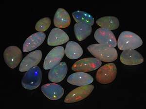โอปอลเอธิโอเปียธรรมชาติ รูปทรงแฟนซี เรียบเนียน หลากสี 10 กะรัต ประกายไฟหลากสี แบบคาโบชอง ราคาขายส่ง สินค้ามาใหม่ - Product Image 2
