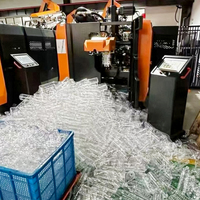 Machine de soufflage de bouteilles PET entièrement automatique à haute vitesse 26000BPH pour la production de bouteilles d'eau minérale de 500 ml à 2 L