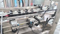 Línea de Llenado de Líquidos Totalmente Automática ESKO de Una Sola Cabeza con Dispositivo Integrado de Llenado y Tapado para Botellas de Plástico de Aceite Comestible
