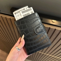 Porte-passeport de voyage multifonctionnel en cuir PU à motif crocodile pour ranger les cartes bancaires et les documents d'identité