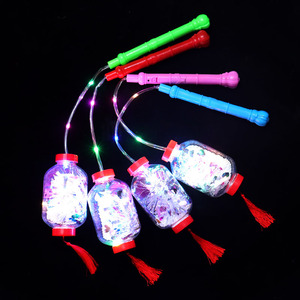 Linterna circular de mano con borla iluminada con luz LED de 10 cm de diámetro para fiestas - Product Image 2