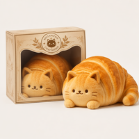 Peluche chat croissant Golden Brown Bakery avec corps texturé pour une décoration mignonne de la maison ou comme cadeau