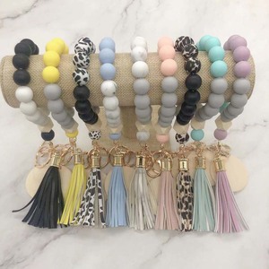 พวงกุญแจห้อยพู่ทำจากไม้เปล่าลายโมโนแกรมลูกปัดซิลิกอน - Product Image 4