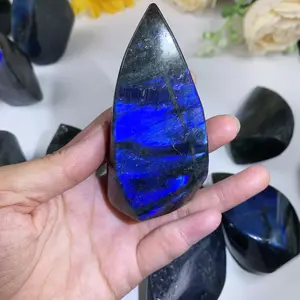 Piedra de cuarzo natural curativa, labradorita azul, llama tallada para decoración, venta al por mayor