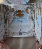 Boîte d'invitation de mariage de luxe élégante avec illustration personnalisée du lieu, design floral 3D et dorure à chaud en relief