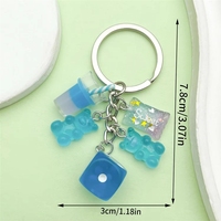 Vente en gros usine : Porte-clés ours dés mignon en résine, tendance, mini jouet anti-stress, pendentif de sac et anneau de clés pour décoration de sac à dos et cadeau