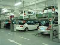 Équipement cubique intelligent de stationnement de système de stationnement de puzzle robotique entièrement automatisé certifié CE pour le garage de parking de voiture