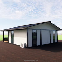 Maison conteneur préfabriquée modulaire extensible en acier avec toit en pente et terrasse pour usage résidentiel ou en station balnéaire