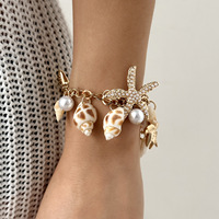 Collier de perles style vacances à la plage exagéré avec étoiles de mer et conques pour femme
