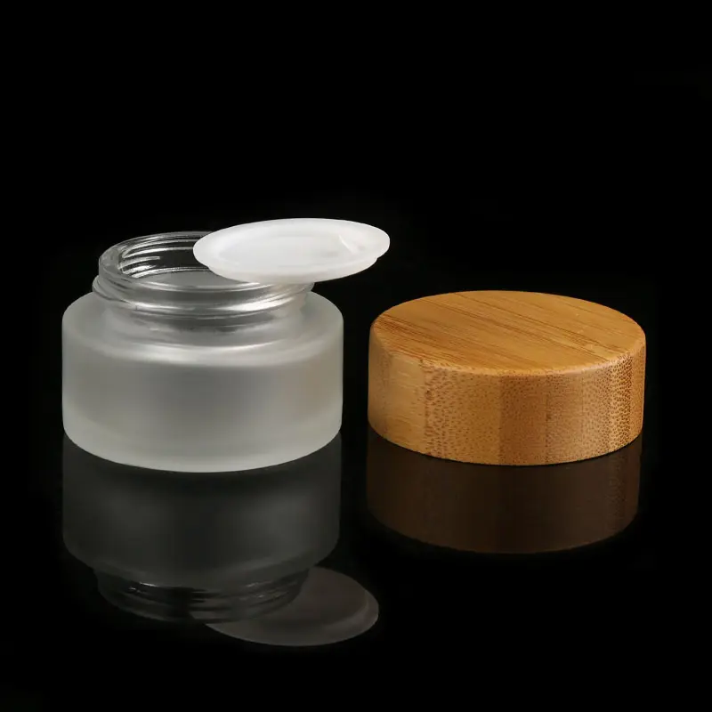 Custom Body Cream Jar Container Nature Bamboo Lid 50g Frosted Cosmetic Glass Cream Jar Packaging With Logo Engraving