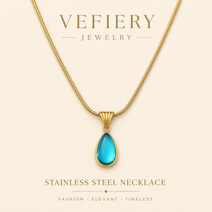 Collier en acier titane couleur or avec pierre bleue en forme de larme et chaîne serpent - Product Image 1