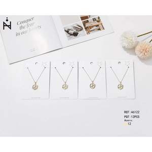 Collana con ciondolo a freccia Zi Conquer in rame placcato oro, set di 12 gioielli alla moda con perline - Product Image 1