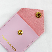 Pochette à bijoux portable en cuir PU miniature avec logo personnalisé, bouton pression, petit sac cadeau pour emballage de bagues, colliers, bracelets, vente en gros