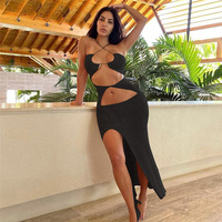 Robe de plage décontractée sexy pour femmes avec col à lacets Sexy Hollow Fashion Split Hip Wrap pour bord de mer et vêtements de vacances