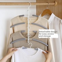 Porte-serviettes multifonctionnel 5 niveaux en métal, design moderne et minimaliste, revêtement éponge anti-traces et antidérapant, rangement gain de place
