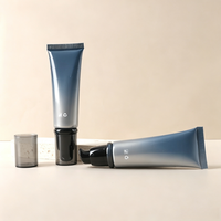 Tube souple rond en plastique noir personnalisé de 50 g, tube de 50 ml pour fond de teint et crème pour les yeux avec pompe sans air