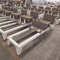Meilleur prix pour un reformer Pilates à cadre blanc pour usage domestique, en alliage d'aluminium, livraison rapide pour studio de Pilates et salle de sport