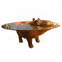 Table basse créative moderne en fibre de verre en forme d'hippopotame avec dessus en verre rond