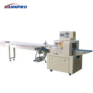 Peach cake/toilet soap/plasticene/candle/doughnut Full-automatic Lower shipping film pillow packing machine Flow Wrapper