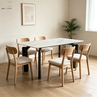 Table à manger contemporaine de luxe en acier inoxydable noir moderne avec plateau en pierre frittée Pandora pour 6 personnes pour salle à manger