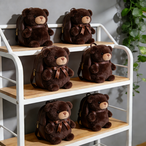 Prix d'usine : Ours en peluche <span class=keywords><strong>chocolat</strong></span>és avec sac à dos, jouets en peluche pour machine à griffes, ours en peluche en gros pour les entreprises de divertissement - Product Image 1