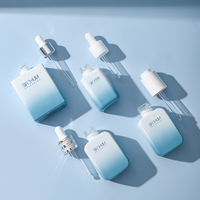 Toptan yeni tasarım kare uçucu yağ Serum şişeleri 15ml 30ml 50ml 100ml şeffaf cam damlalık şişe ile ambalaj kutusu