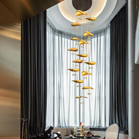 Lustre moderne de luxe en cristal et cuivre doré à LED pour plafonds hauts, escaliers en colimaçon, halls d'entrée et halls d'hôtel