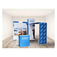 Solution de stand d'exposition 10ftX10ft : Mur d'affichage publicitaire en tissu tendu imprimé avec podium rigide et éclairage LED