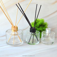Bouteille diffuseur de parfum en verre transparent rond de luxe 100 ml avec bouchon à vis et marquage à chaud pour la vente en gros