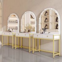 Table de Maquillage Moderne de Luxe en Métal Noir et Or avec Miroir LED Arqué et Hauteur Réglable pour Salon de Coiffure - Vente en Gros
