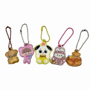 Colgante reflectante de PVC personalizado con esponja de carga de voltaje, llavero fluorescente que brilla en la oscuridad para mochila escolar infantil - Product Image 1