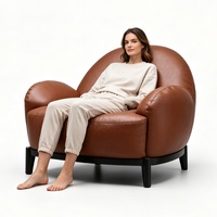 Fauteuil à bascule relaxant et inclinable de style moderne pour salon, avec dossier haut et design ergonomique