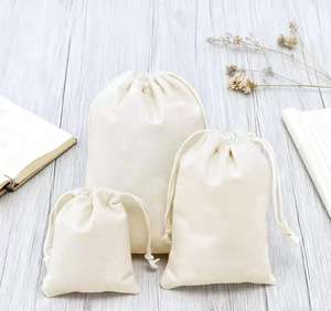 ถุงผ้าฝ้ายมัสลินแบบมีเชือกผูก พร้อมริบบิ้น สำหรับใส่ของขวัญหรือบรรจุภัณฑ์  รับทำโลโก้ตามสั่ง - Product Image 1