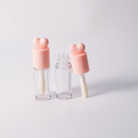 Vente en gros de tubes à gloss à lèvres vides Yunshan YS, diamètre 18 mm, couvercle en forme de cœur rose, plastique transparent épaissi, imprimé à l'écran